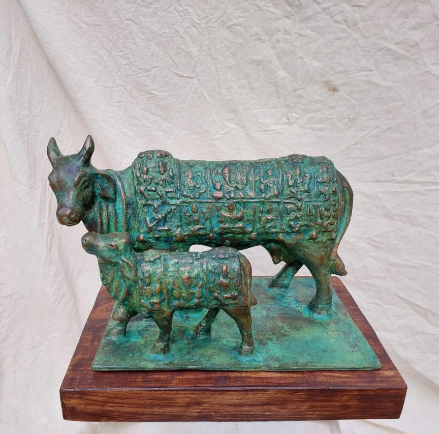 Kamdhenu Cow' religious Brass, Metal sculpture by artist Rohan Sonavane, 13x10 inch, on brass, metal