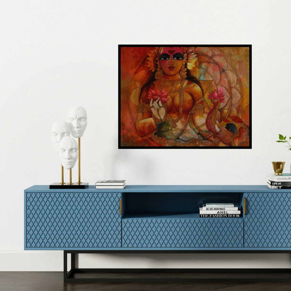 'Lakshmi (Lakshmi Elephant and Lotus)' painting by N P Rajeshwarr shown on a wall in a furnished room.