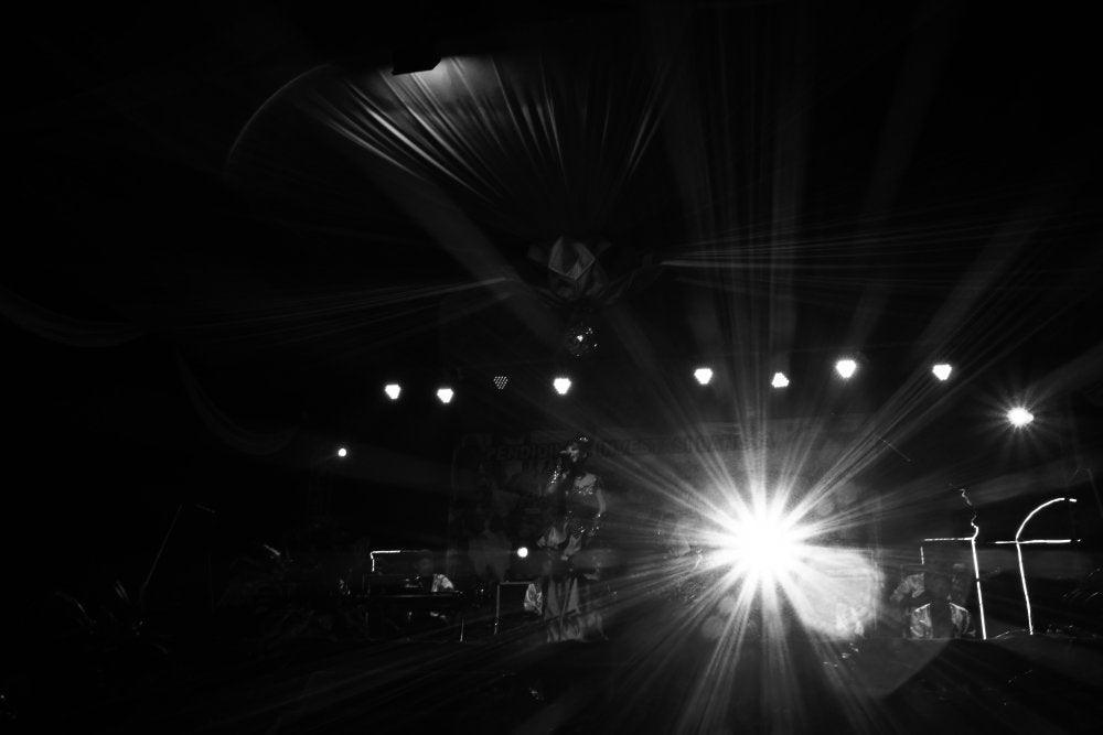 Erotic photography titled 'Light Of Stage', 11x17 inches, by artist Rahmat Nugroho on