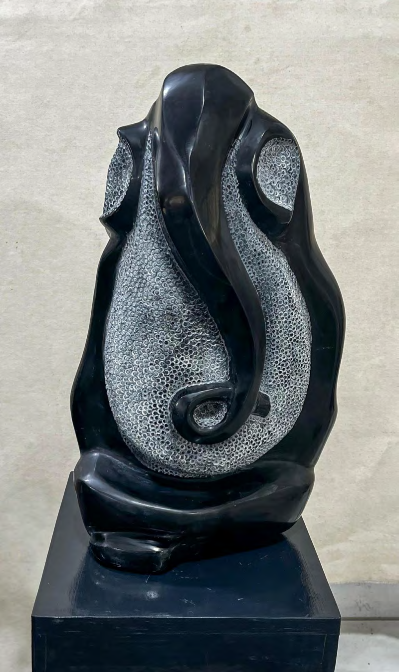 Lord Ganesha' religious Black Obsidian sculpture by artist Rambali Prajapati, 21x14 inch, on black obsidian