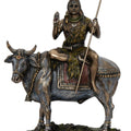 Religious handicraft titled 'Lord Shiva Sitting On Cow', 9x8x4 inches, by artist Brass Handicrafts on Polyresin And Bronze