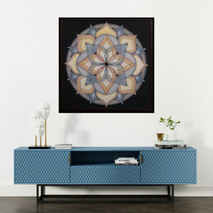 'LOTUS BLOOMING (Symmetrical Harmony)' painting by Manju Lamba shown on a wall in a furnished room.