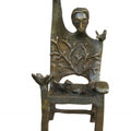 Figurative sculpture titled 'Memorable Chair 1', 10x5x5 inches, by artist Asurvedh Ved on Bronze