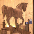 Cityscape sculpture titled 'Mid Gallop', 38x27x3 inches, by artist Shriram Mandale on Teak Wood