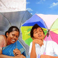 Figurative acrylic painting titled 'Mother And Child Umbrella', 24x31 inches, by artist Sakthivel Ramalingam on Canvas