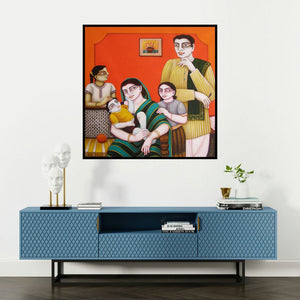 'My Family' painting by Gautam Mukherjee shown on a wall in a furnished room.