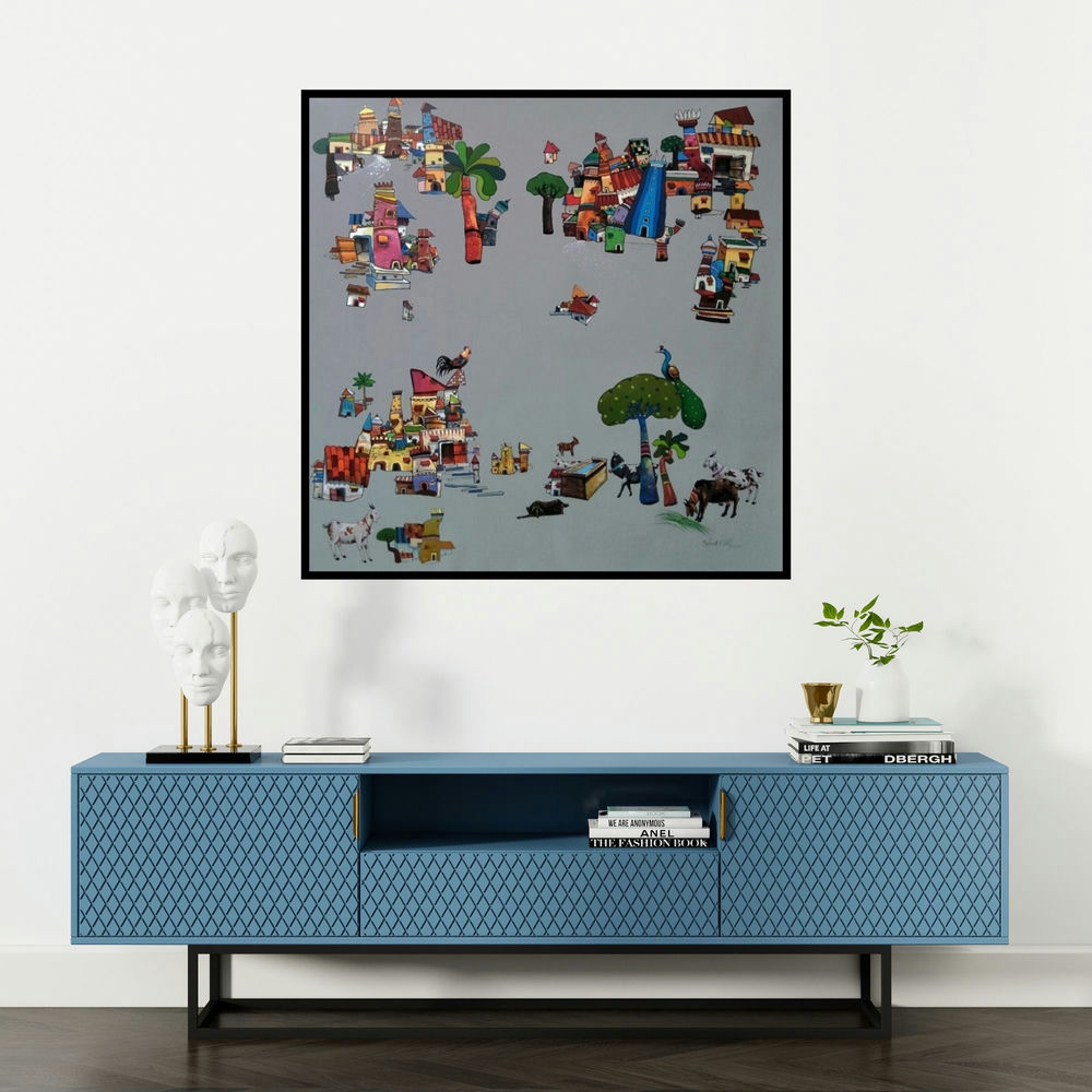 'My Village 1 (Worlds Apart)' painting by Manjunath Wali shown on a wall in a furnished room.