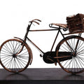 Still-life sculpture titled 'Newspaper On Bicycle', 11x24x8 inches, by artist Ram Kumbhar on Mixedmedia