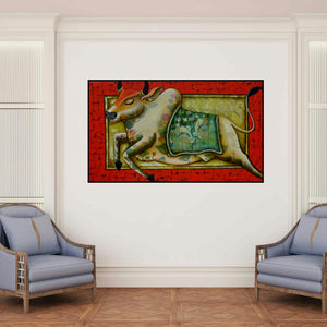 'Passion In Motion (Sacred Strength)' painting by Anupam Pal shown on a wall in a furnished room.