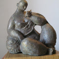 Figurative sculpture titled 'Reading 2', 13x12x12 inches, by artist Shankar Ghosh on Bronze