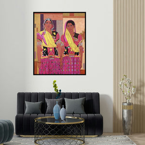 'Ready For The Holi Dance (Tribal Women)' painting by Gopal Nandurkar shown on a wall in a furnished room.