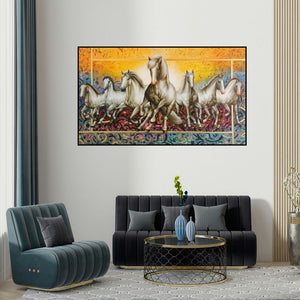 Pradeep Kumar's 'Rising Horses (The Majestic Gallop)' painting visualized above a sofa in a contemporary room.