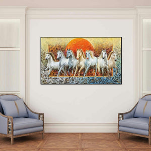 'Rising Horses' painting by Pradeep Kumar shown on a wall in a furnished room.