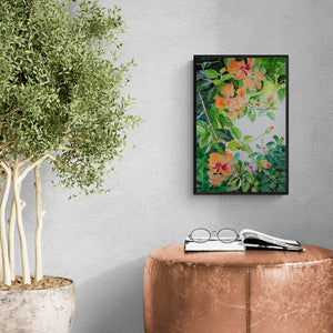 Vishwajyoti Mohrhoff's painting 'Schizopetalus Hibiscus And Catharanthus (Sunlit Blooms: A Burst of Color)' displayed in a modern living room setting