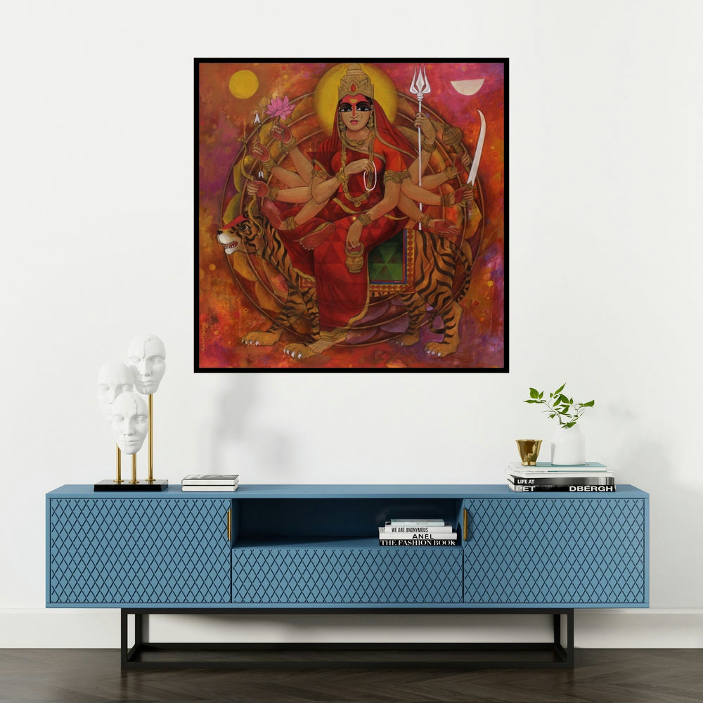 'Shakthi (Durga: Triumphant Goddess)' painting by N P Rajeshwarr shown on a wall in a furnished room.