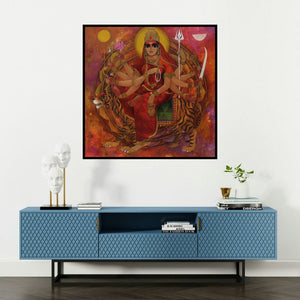 'Shakthi (Durga: Triumphant Goddess)' painting by N P Rajeshwarr shown on a wall in a furnished room.