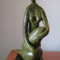 Figurative sculpture titled 'Sitting Lady 3', 29x9x10 inches, by artist Shankar Ghosh on Bronze