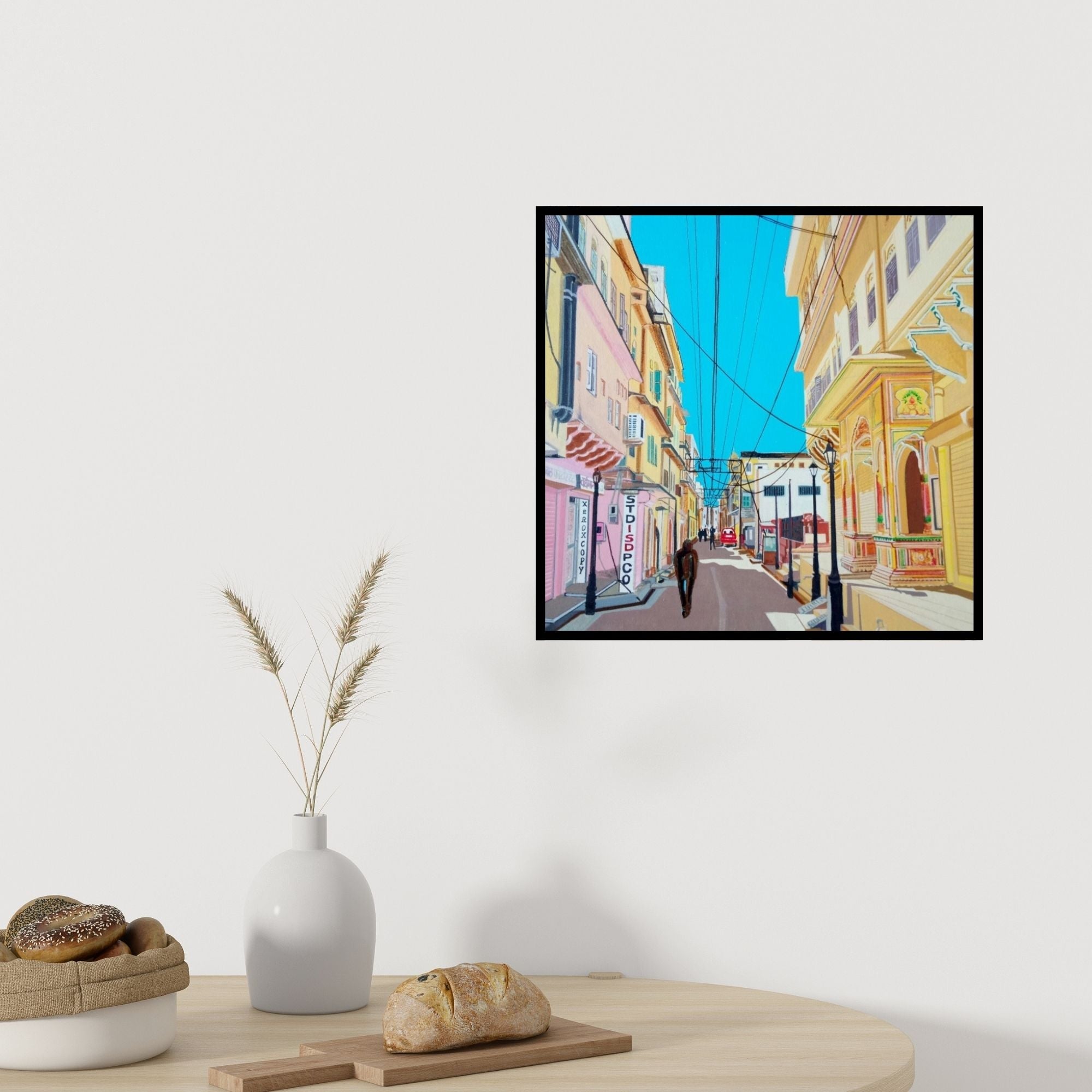 Preview of 'Street Series 6 (Jodhpur's Blue Hues)' Painting by Ajay Mishra shown on a wall in a furnished room.