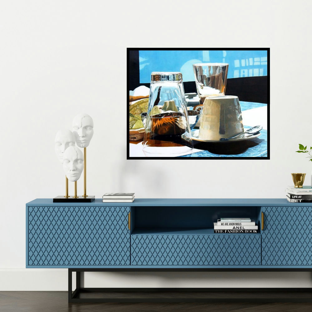 'Sunday Breakfast' painting by Sripriya Mozumdar shown on a wall in a furnished room.