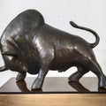 Animals sculpture titled 'The Bull', 9x12x6 inches, by artist Dilip Paul on Bronze