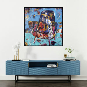 'The Mighty Chair 2 (The Daydream Chair)' painting by Prashalee Gaikwad shown on a wall in a furnished room.