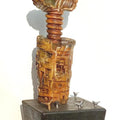 Figurative sculpture titled 'Tune The Time 2', 24x8x8 inches, by artist Gurucharan Singh on Mixedmedia