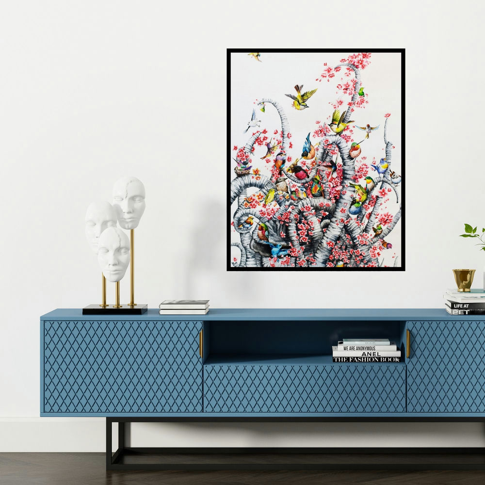 'Untitled 2 (Birds in Bloom)' painting by Bikash Pradhan shown on a wall in a furnished room.