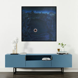 'Untitled 2 (Lunar Eclipse)' painting by Bhagyanath C shown on a wall in a furnished room.
