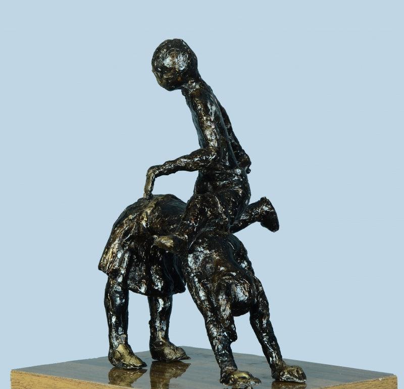 Figurative sculpture titled 'Village Play', 11x9x7 inches, by artist Kishor Sharma on Bronze