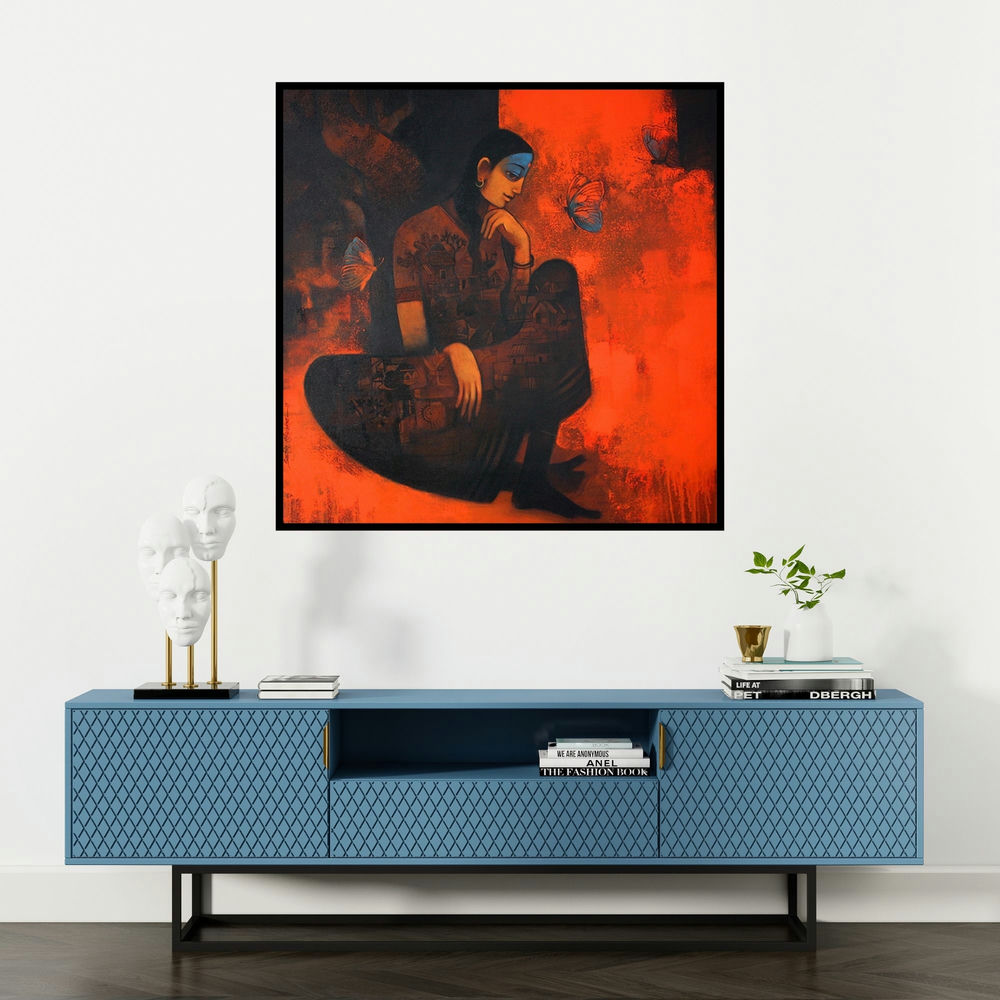 'Village Woman (Contemplation)' painting by Sachin Akalekar shown on a wall in a furnished room.