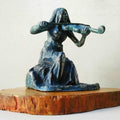Figurative sculpture titled 'Violin Girl', 8x7x5 inches, by artist Akhlesh Gaaur on Aluminium